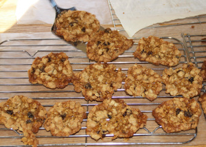 Putting cookies on wire rack to cool